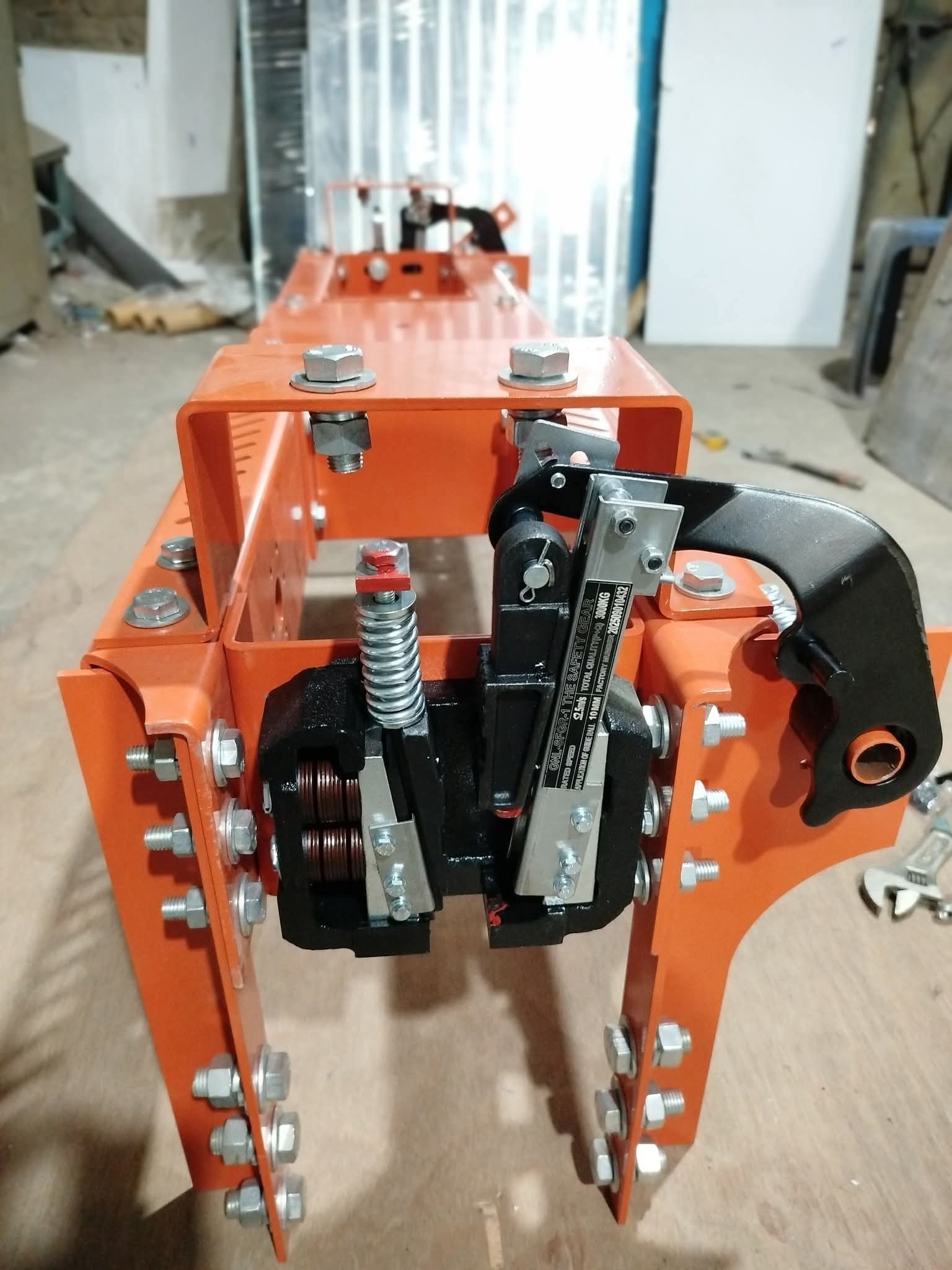 Elevator car frame safety gear assembly